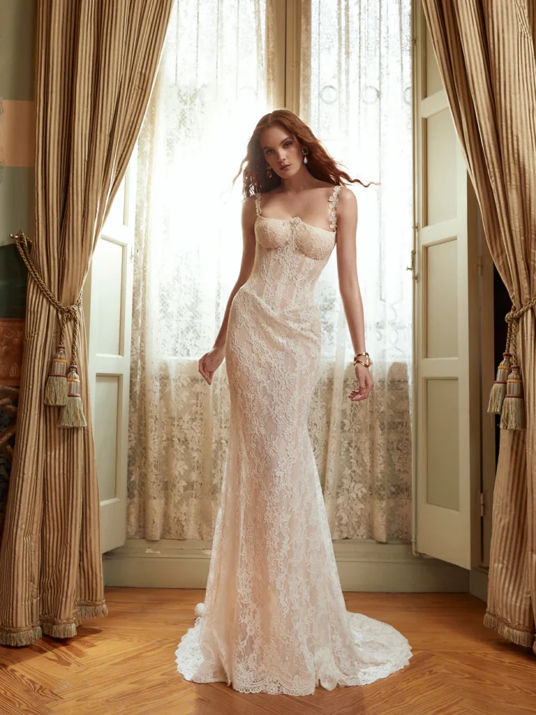 lace fit-and-flare wedding gown with spaghetti straps and a corset bodice at La Mariée Boutique Tulsa