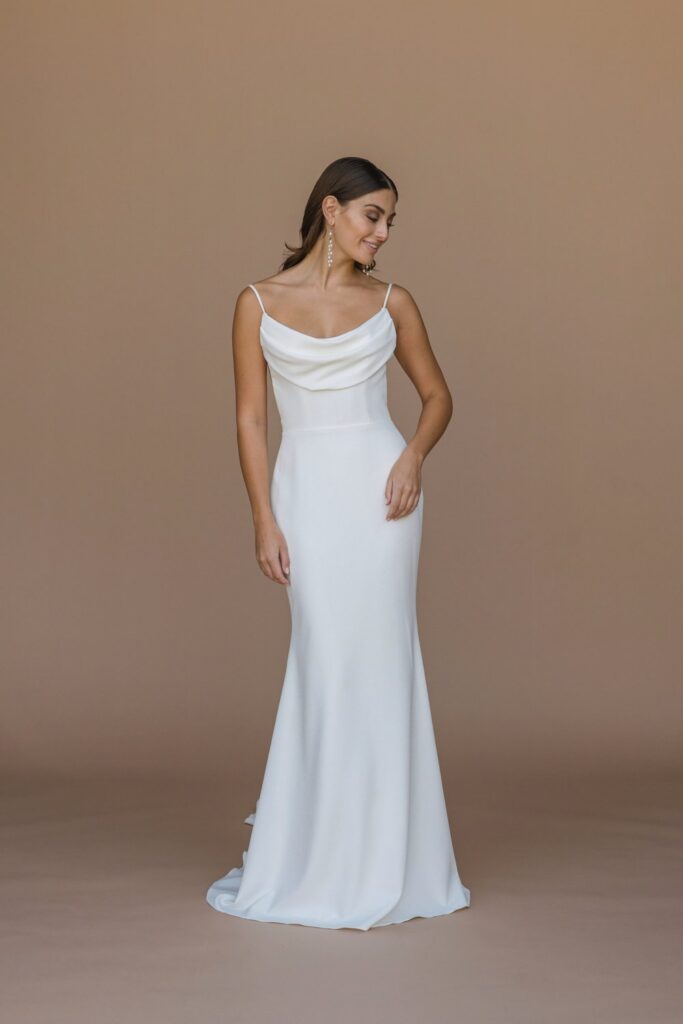 Minimalist cowl-neck spaghetti strap crepe fit-and-flare wedding gown at La Mariée Boutique Tulsa