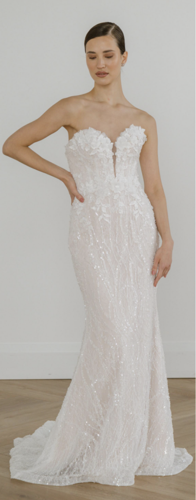 Strapless plunging sweetheart mermaid wedding gown with 3D floral appliqué bodice and allover sequin embellishment at La Mariée Boutique Tulsa