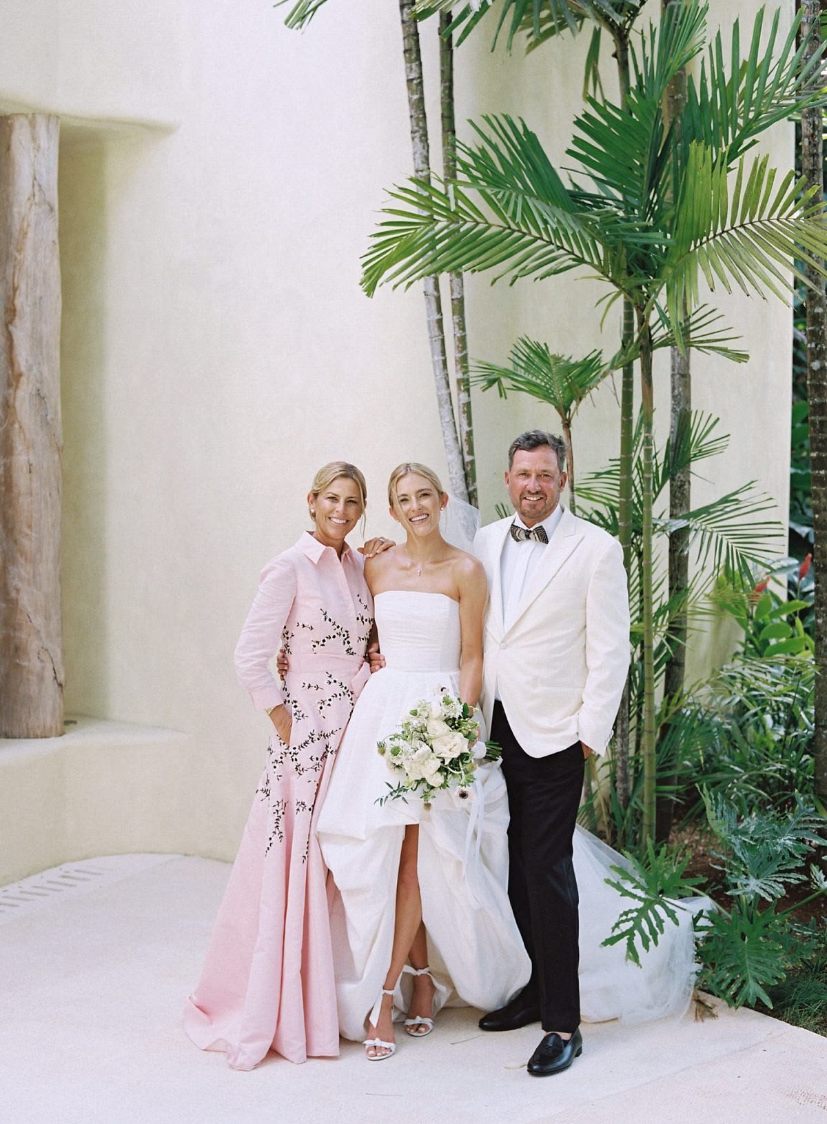 Mother and father wedding portrait after a seaside ceremony