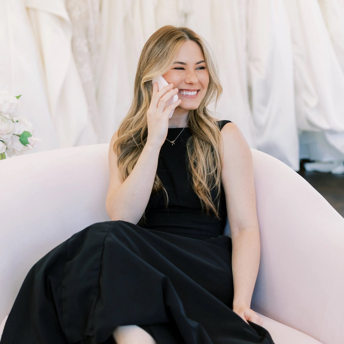 Stylist on a call with a bride